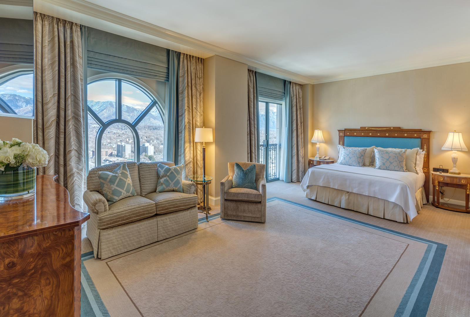 Grand America Hotel Presidential Suites bedroom with arch windows and a king size bed