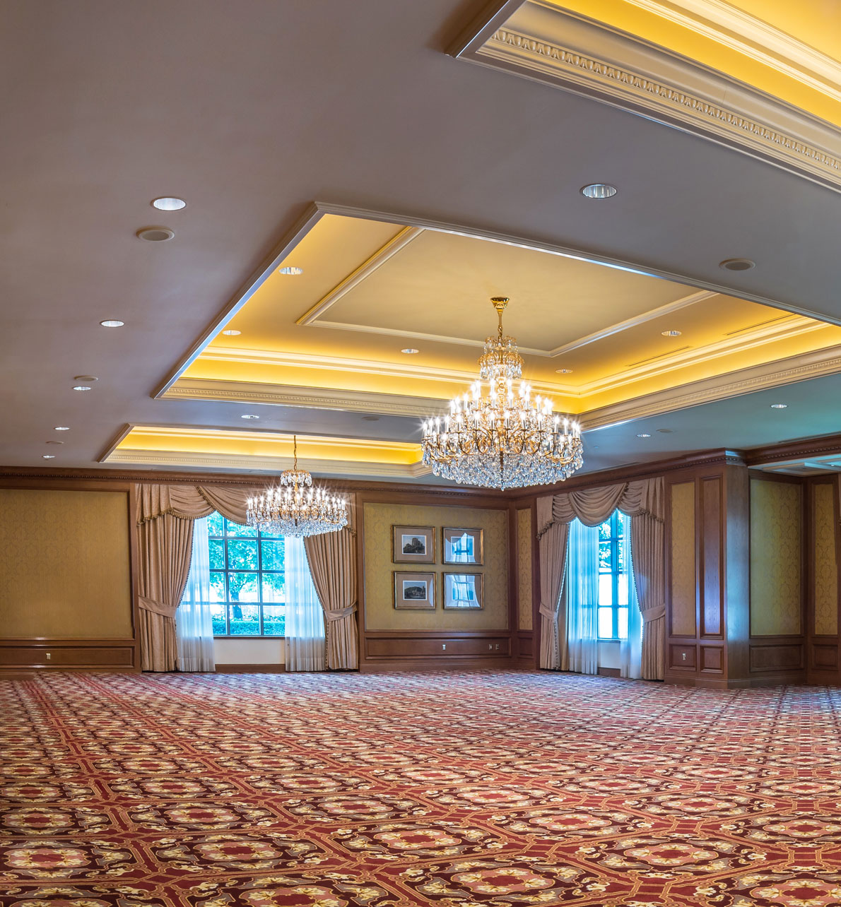 Savoy meeting space at The Grand America Hotel with chandeliers and wood trim.