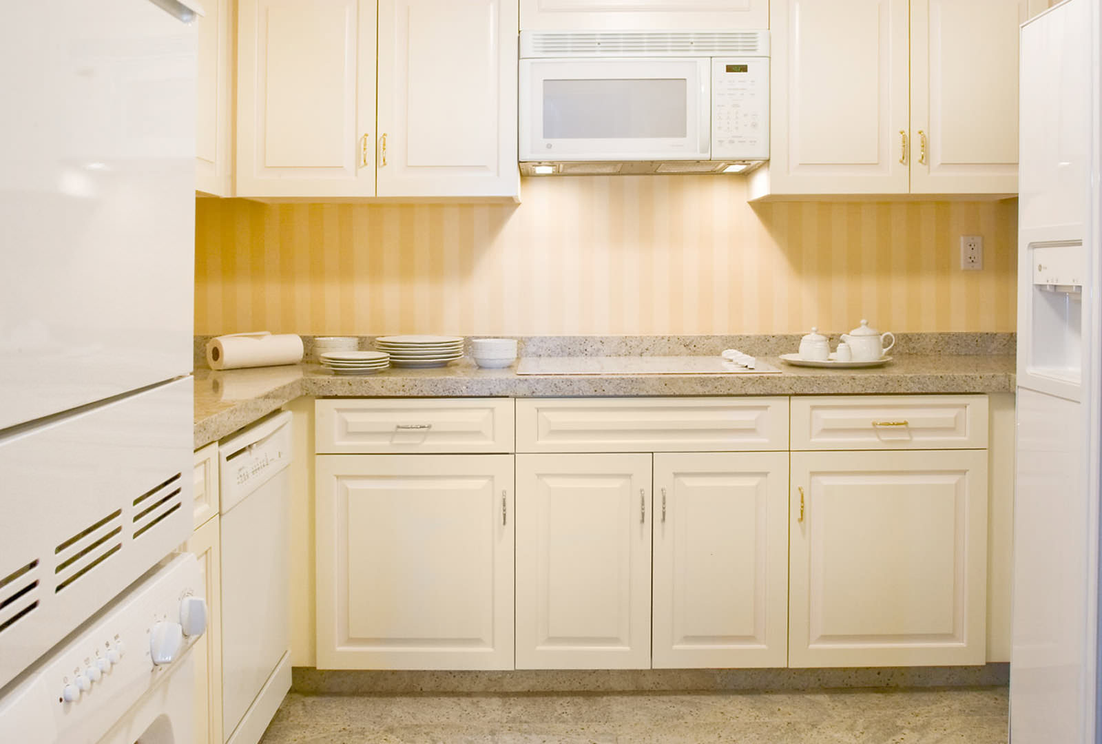 Grand America Hotel kitchen suite with white cabinets and white appliances