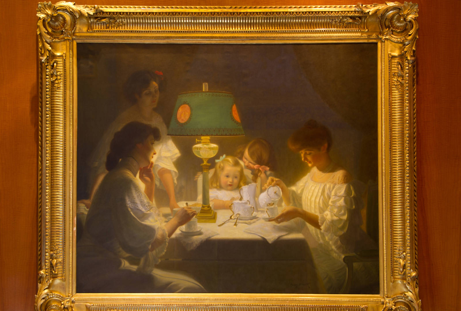 Painting by Henri Bouvet, from the Grand America's Art, depicts the painter's family having tea.