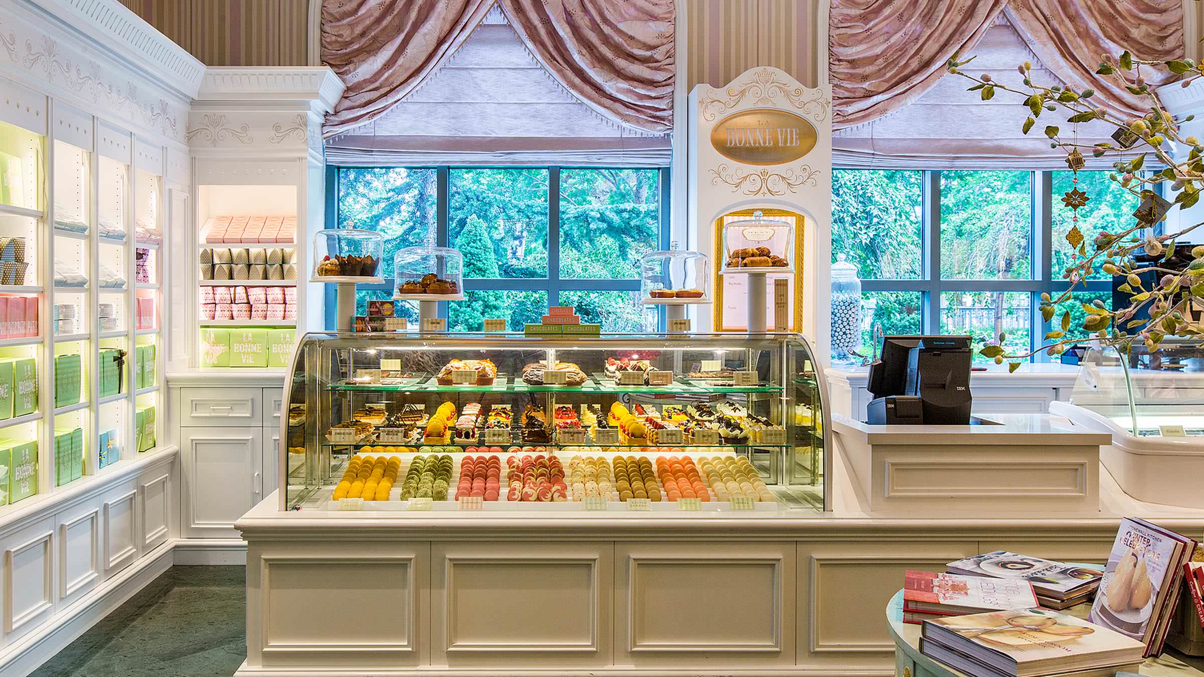 La Bonne Vie, french pastry shop in the Grand America Hotel with pastry boxes, cookies, and pink curtains.