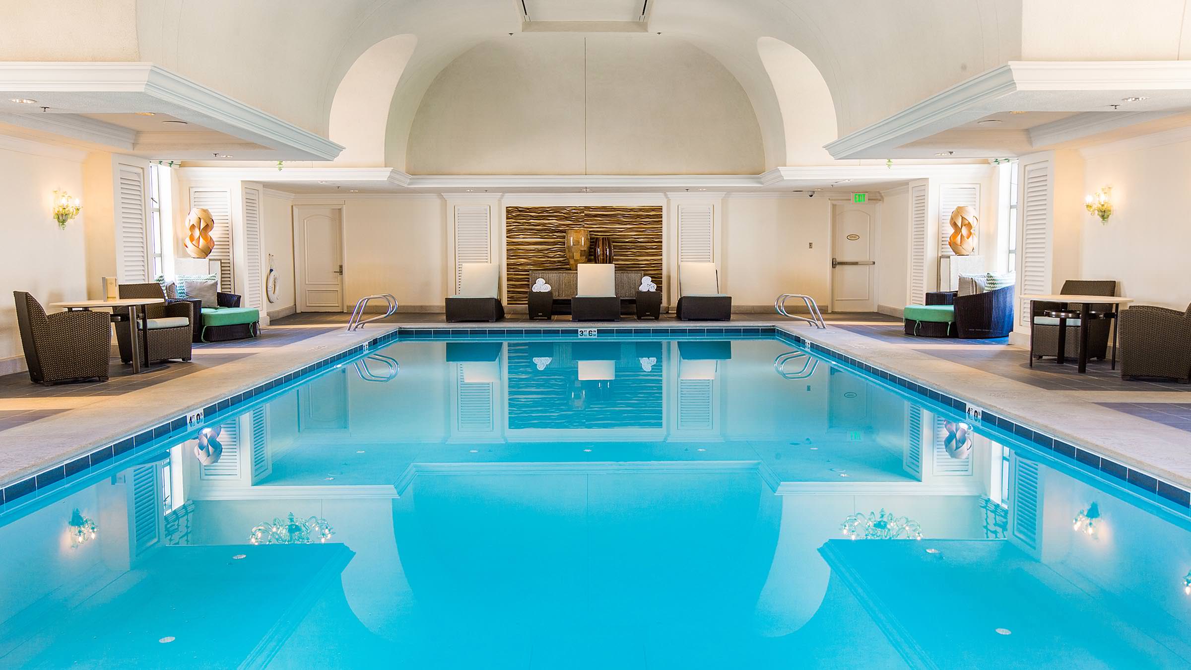 The Grand Spa's Indoor Pool featuring arched ceilings and Italian chandeliers.