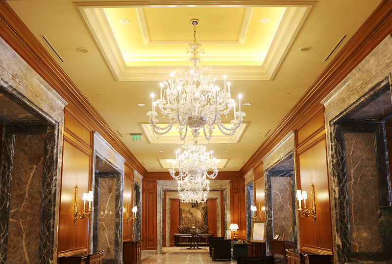 Blown glass chandeliers hanging in The Grand America Hotel's lobby