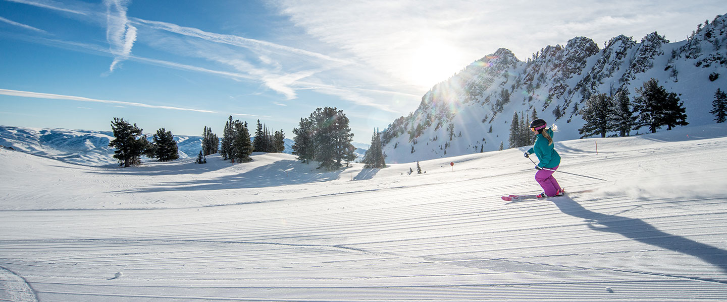 Girl skiing at Snowbasin Mountain Resort in Ogden, Utah.