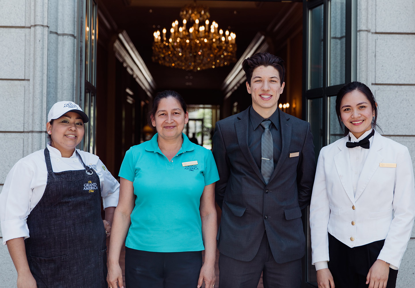 Grand America staff members posing for a photo during a employee appropriation celebration