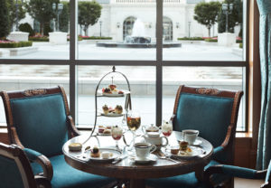 Afternoon Tea in the Lobby Lounge at The Grand America featuring dainty finger sandwiches, sweet treats, scones, and unique teas.