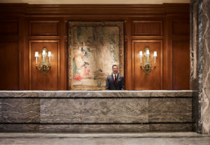Front Desk with Front Desk agent in Lobby