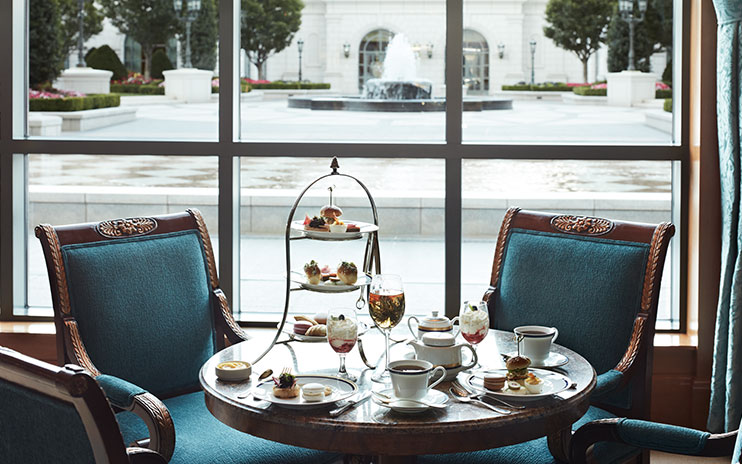 Afternoon Tea in the Lobby Lounge at The Grand America featuring dainty finger sandwiches, sweet treats, scones, and unique teas.