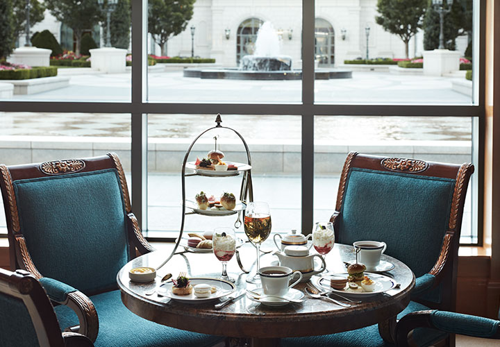Afternoon Tea in the Lobby Lounge at The Grand America featuring dainty finger sandwiches, sweet treats, scones, and unique teas.