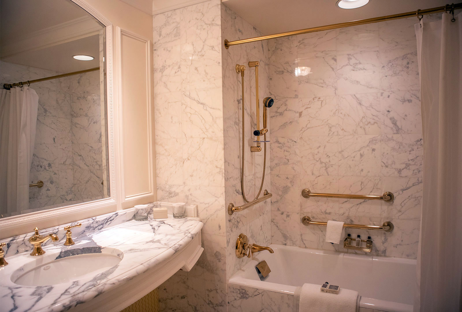 Guest Bathroom with Marble Sink and Bathtub with ADA Rails