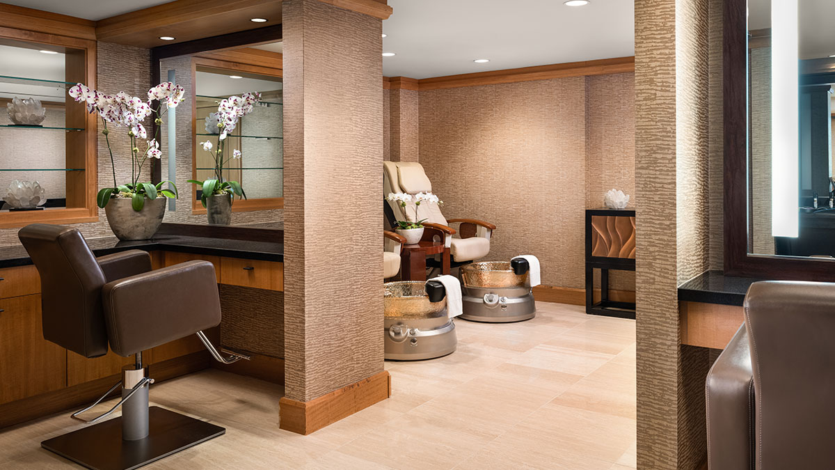 Grand Spa's Salon featuring massage pedicure chairs.