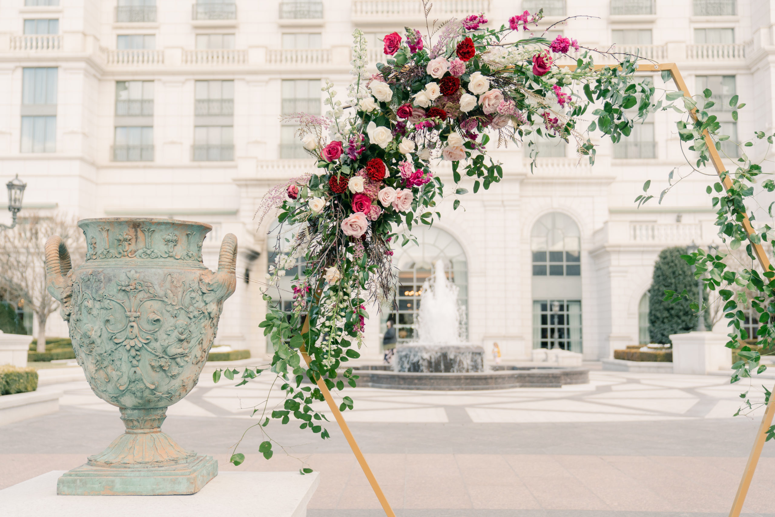 Florals on a metal frame in the center Courtyard for a Wedding at The Grand America Hotel.