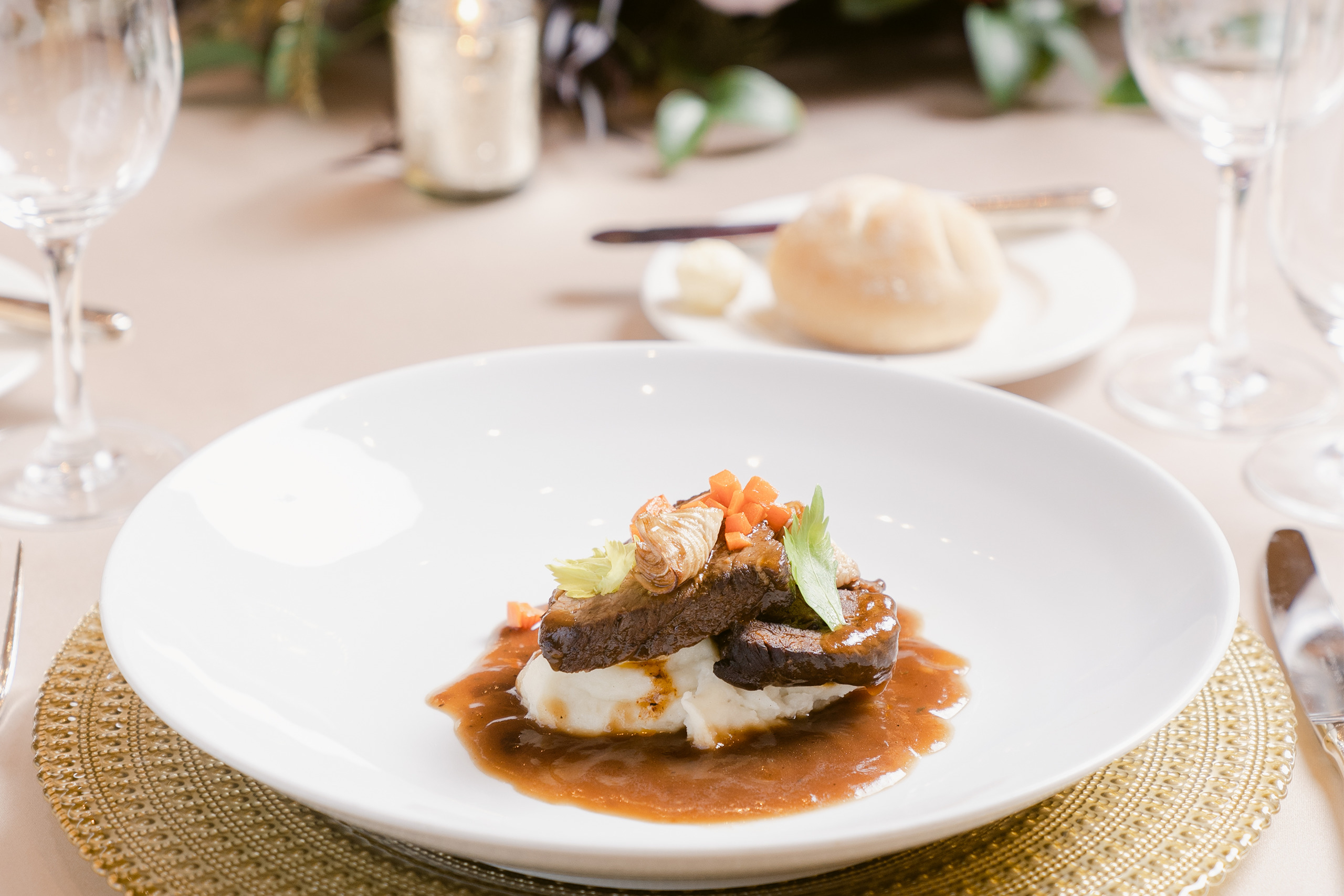 Beef served over mashed potatoes as a main entree for a wedding at The Grand America Hotel.