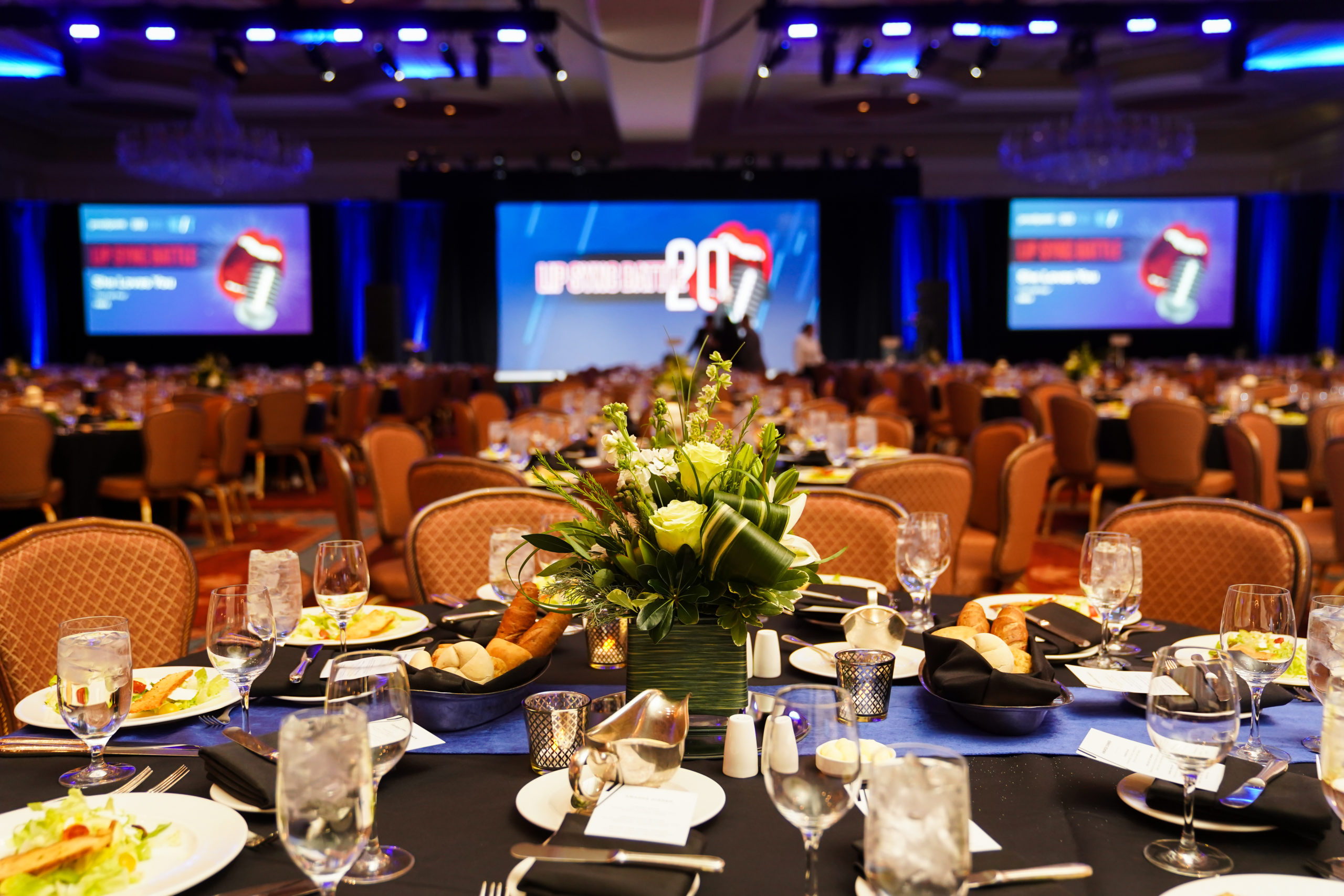 The Grand Ballroom set up for a large-scale event held at The Grand America Hotel.