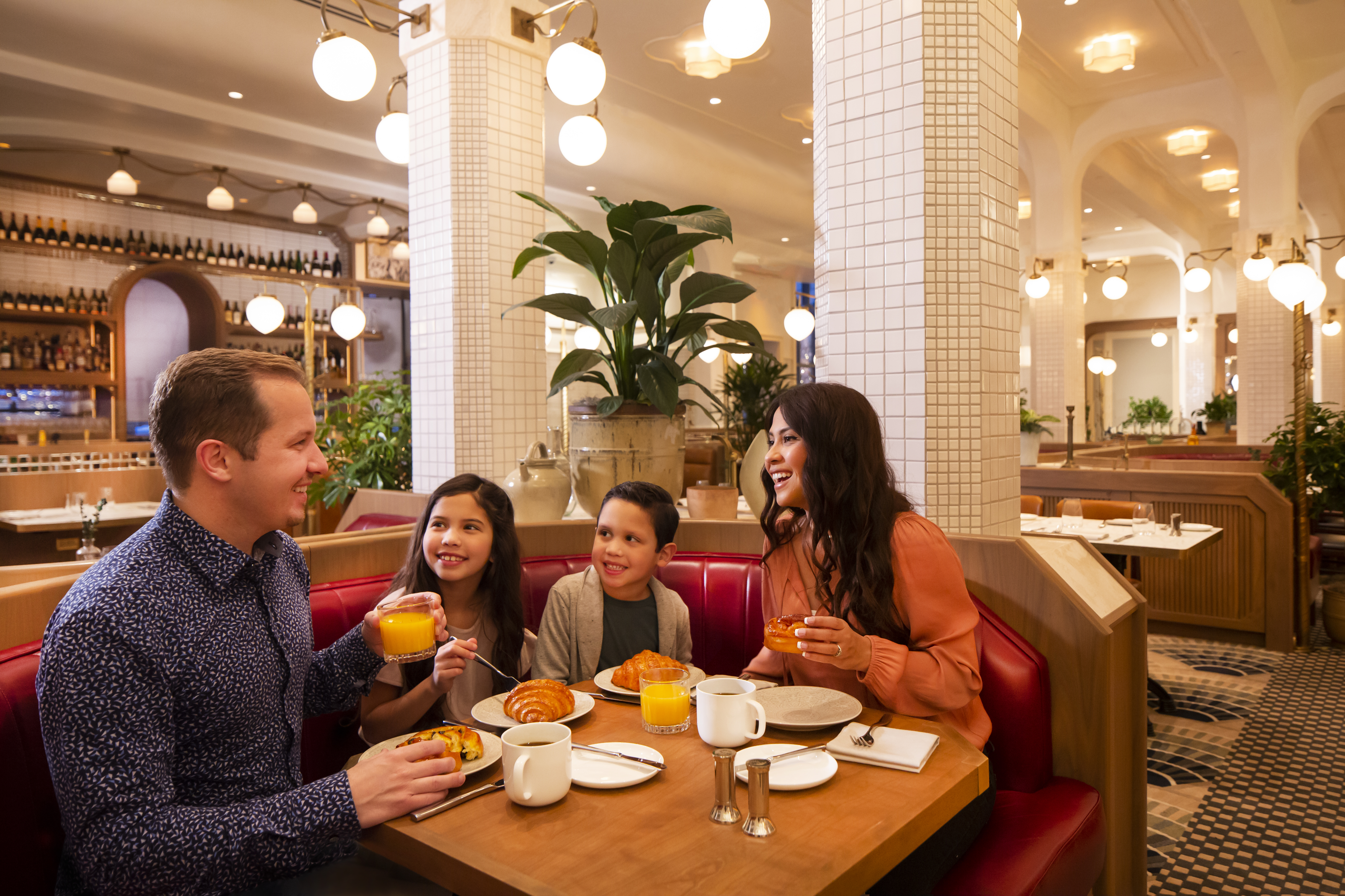 Family enjoying a meal together at Laurel Brasserie & Bar