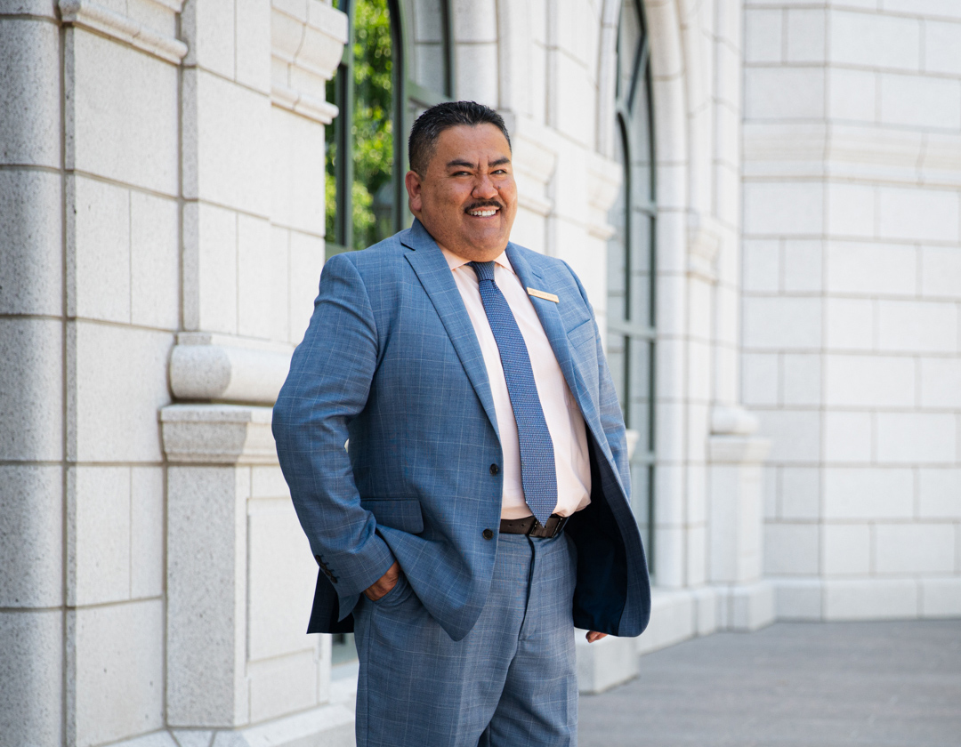 Javier Robles standing in front of Grand America